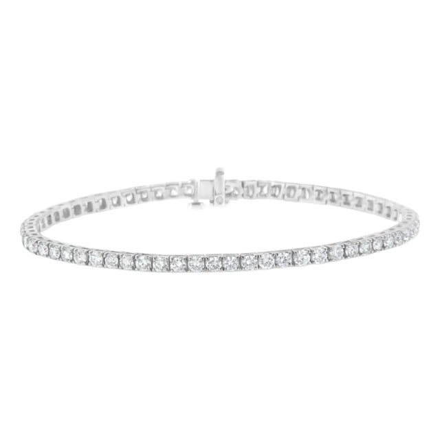 IGI Certified 7.0 Cttw Diamond 14K White Gold Classic 7â€ Tennis Bracelet (H-I Color, I1-I2 Clarity) For Sale