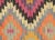 Bring a unique and traditional style to your home with this handcrafted Vintage Turkish Kilim. Boasting a classic wool-on-...