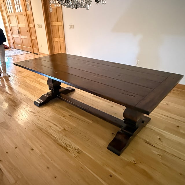 Wide Plank Trestle Dining Table This table is as solid as it is handsome. Wide planks comprise the tabletop with the...
