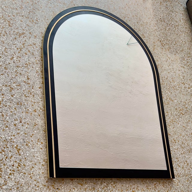 Enhance your home decor with this Art Deco-inspired arched wall mirror, seamlessly blending vintage charm with modern...