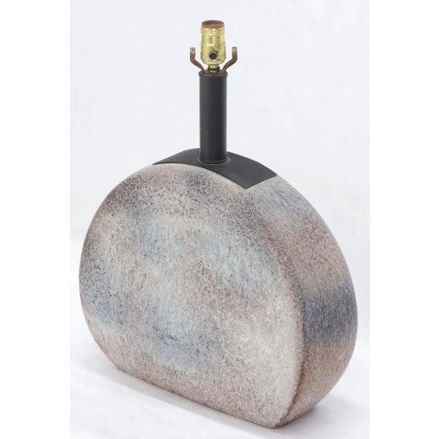 Contemporary large 22" diameter pendant shape ceramic and bronze table lamp.