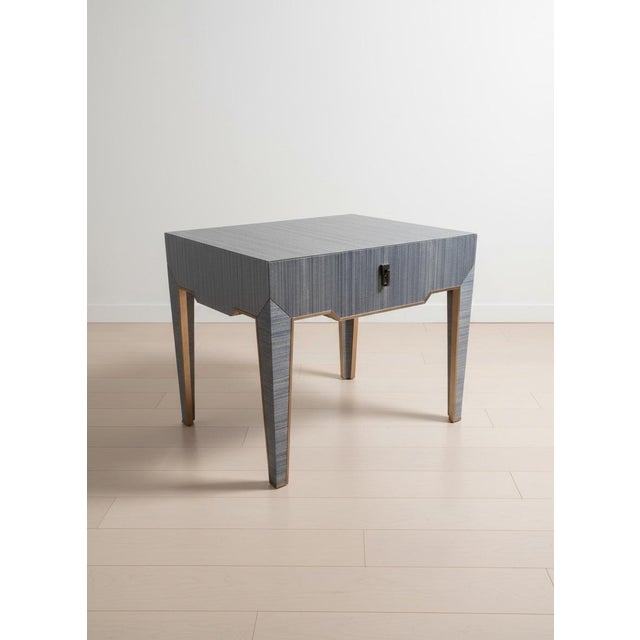 A refined example of Villa & House’s signature tailored aesthetic, this Madeline 1-drawer side table features a lacquered...