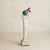 A French pedestal from the 1970s, where the language of Art Nouveau is carried forward through hand and surface. The...