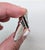 Art Deco Vintage 1980s Signed Givenchy Art Deco Style Rhodium Black Enamel & Clear Rhinestone Brooch For Sale - Image 3 of 12