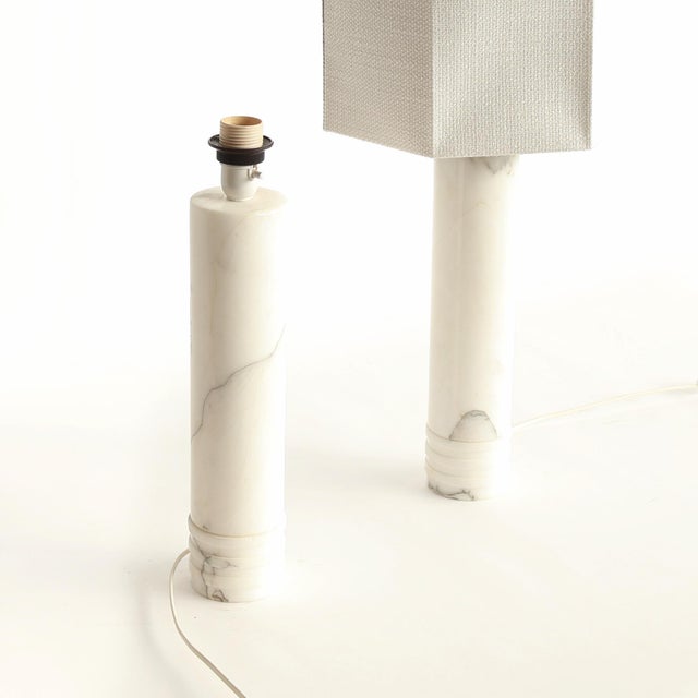 Elegant Scandinavian table lamps model “B-10,” produced by Bergboms in Sweden during the 1960s. These lamps are crafted...