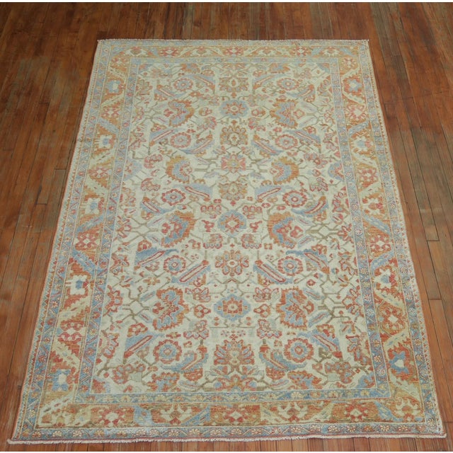 High Decorative Persian rug with dominant accents in ivory blue and orange. Perfect for a grand foyer