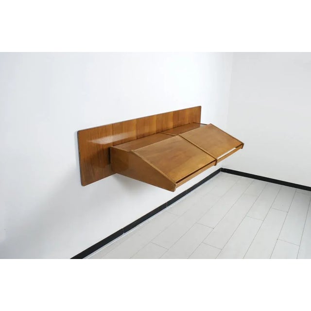 Wall-hung console table, Italian production from the early 1950s, the style and lines of Carlo Mollino. This is not a...