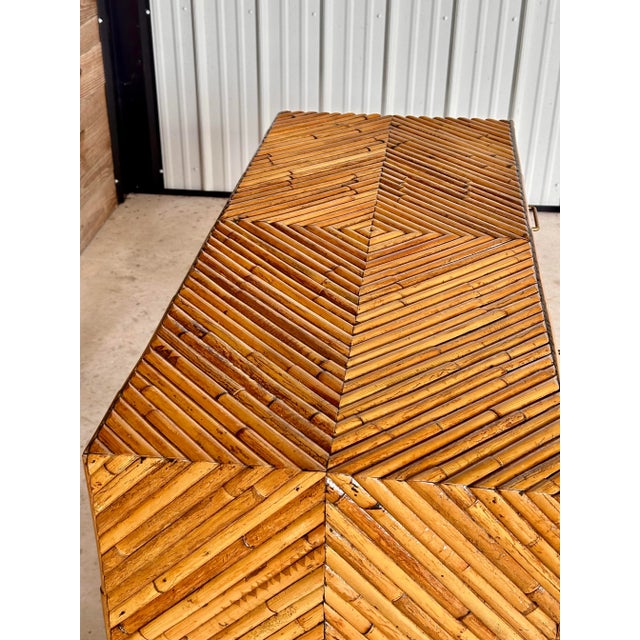 Fabulous vintage bamboo desk featuring an intricate geometric design with diagonally arranged bamboo detailing throughout...