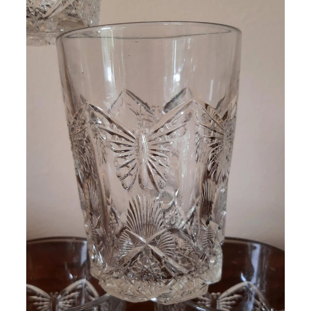 We have highlighted and magnified the inconsistencies in this 100+year old glassware. Inconsistencies consist of bubbles...