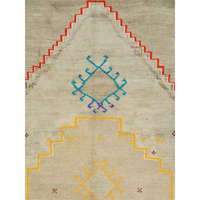 A vintage Turkish Anatolian carpet from the mid-20th century with cotton highlights.