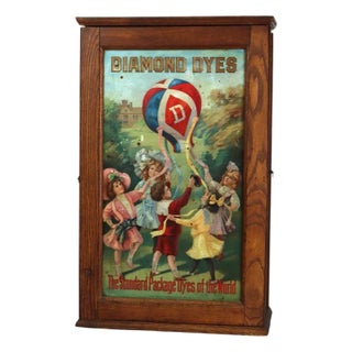 Antique Wells & Richardson Co. Diamond Dye Oak & Embossed Country Store Cabinet For Sale