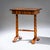 Biedermeier sewing table with a drawer fitted with compartments for small accessories. The top is veneered in mirrored...