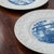 A pair of Wedgewood dinner plates depicting scenes from the campus of Duke University. 10 ½ inches wide