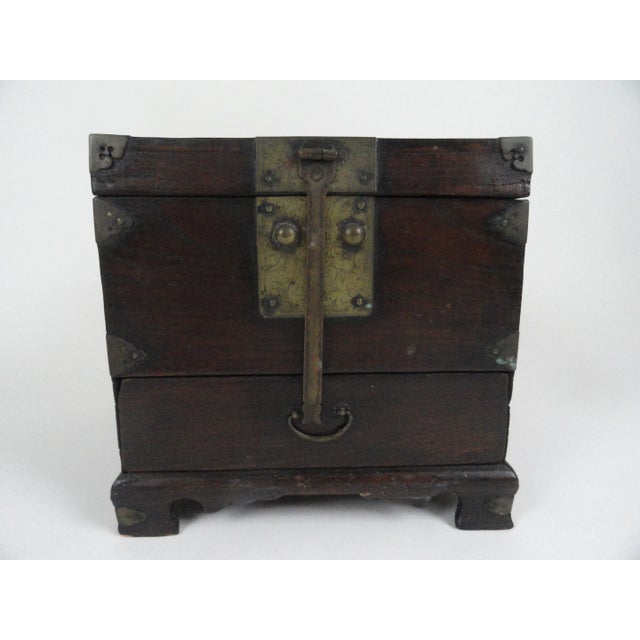 19th century wood Korean box with trunk opening and bottom drawer. Original hardware, original finish.