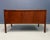 Elevate your workspace with this 1960s Mid-Century Modern walnut writing desk by Jens Risom. This desk showcases rich...
