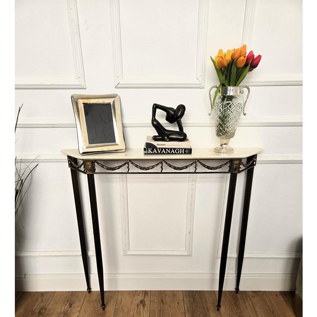 Very elegant and refined Italian 1950s Mid-Century Modern in baroque neoclassical design wall console table. The beautiful...
