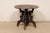 A nicely-carved Guéridon style table from the turn of the 19th and 20th century. This antique American occasional table,...
