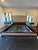 Inspired by clean-lined classical forms, this bed frame balances simple silhouettes with refined restraint. Handcrafted,...