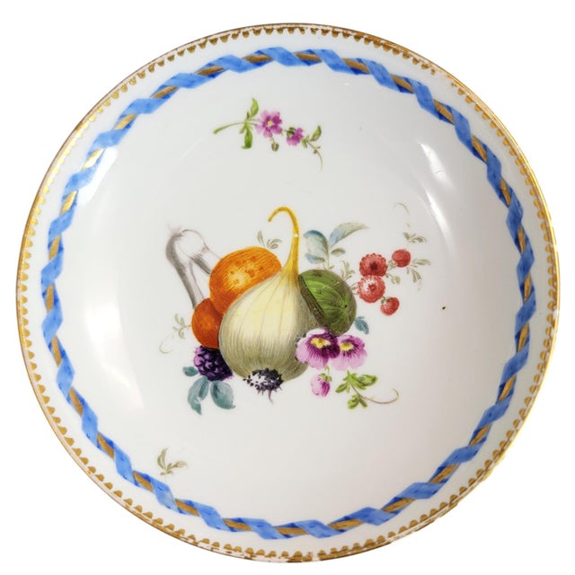 A finely made Meissen porcelain saucer from the Marcolini period, dating to circa 1774–1814. The centre is painted with a...