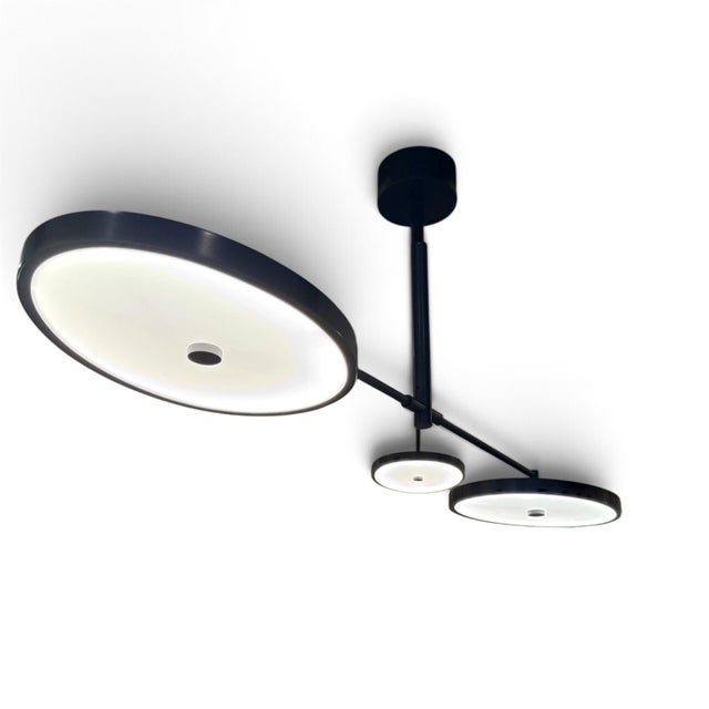 Stunning three-light chandelier designed by Stefan Gulassa for Holly Hunt. The Helios was inspired by Alexander Calder’s...