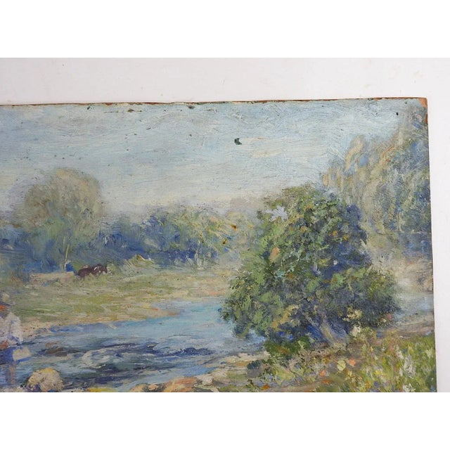 Early 20th century plein air oil on artist board impressionist painting of river landscape with fly fisherman. Signed...