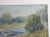Early 20th century plein air oil on artist board impressionist painting of river landscape with fly fisherman. Signed...