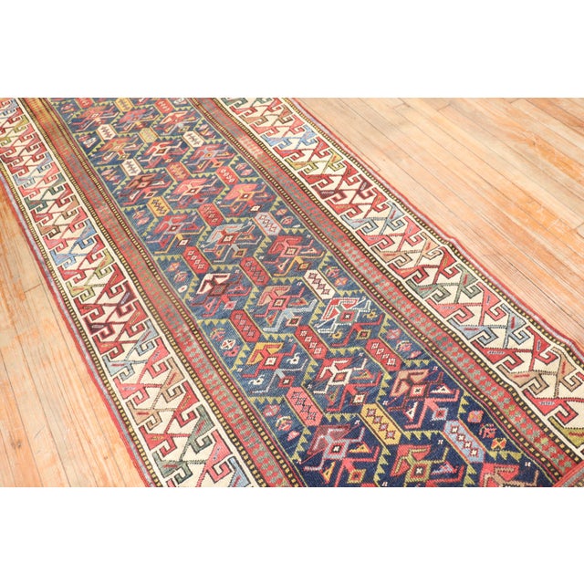 an early 20th Century Caucasian Gendje Runner 3'5'' x 9'9'' “Gendje rugs were frequently made in a long, narrow format,...