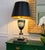 Large vintage chinoiserie-style urn table lamp featuring hand-painted floral decoration, Sèvres-style scenic cartouches,...