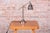 Socket: E27 This industrially styled and purposeful table lamp dates from the 1930s in Czechoslovakia, reflecting...