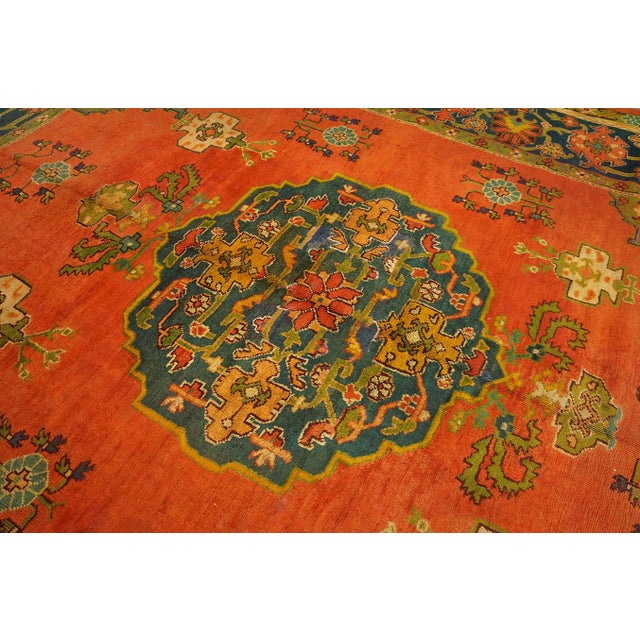 Decorative Turkish Antique Oushak Rug on a Red-Raspberry Background Color With Medallion Pattern For Sale - Image 11 of 12