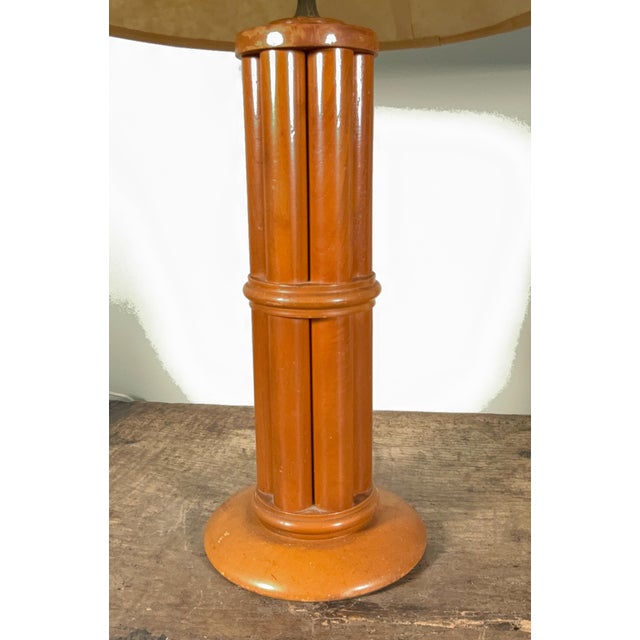 This pair of table lamps features turned wood bases finished to resemble bamboo with fluted column forms and ring...