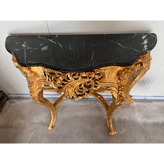 Rococo gold console table in wood with fine black marble Good condition
