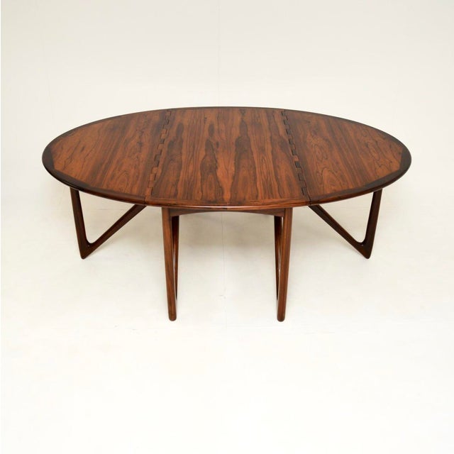 An absolutely magnificent Danish vintage gate leg dining table by Niels Koefoed. This iconic design was made in Denmark by...