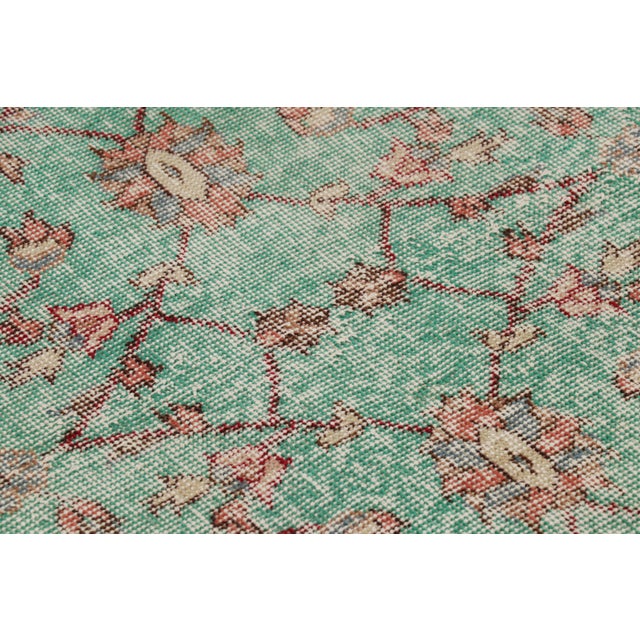 Hand-knotted in wool and originating from Turkey circa 1960 – 1970, this 3x5 vintage Zeki Müren rug is a unique addition...