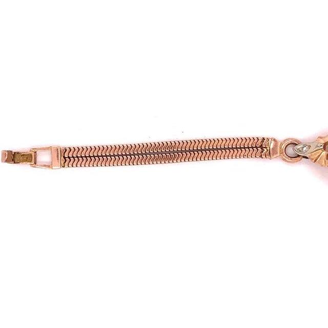 14 Kt Yellow Gold Omega Ladies Wrist Watch 17 Jewels Unadjusted with several small stones. Weighing 15.7 grams without the...