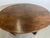 An early English oval-shaped Accent Table with a solid 3-plank. Finely turned legs and stretchers. Age shows well from the...