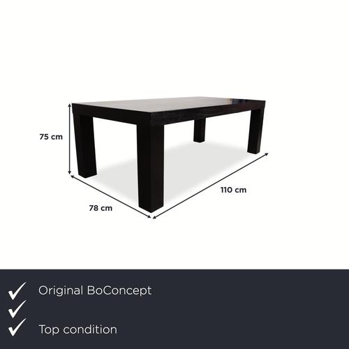 This black dining table from BoConcept brings a touch of casual style to your dining room. The design eschews unnecessary...