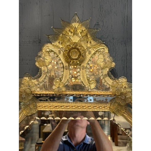 The Vintage Venetian Etched Glass Mirror is a beautifully crafted piece that adds a touch of elegance to any room. This...