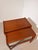 Beautiful set of two vintage Danish modern nesting tables crafted from warm teak wood. These elegant side tables feature...