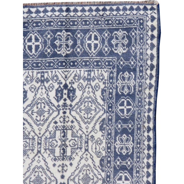 A vintage Indian cotton Agra carpet from the second quarter of the 20th century.