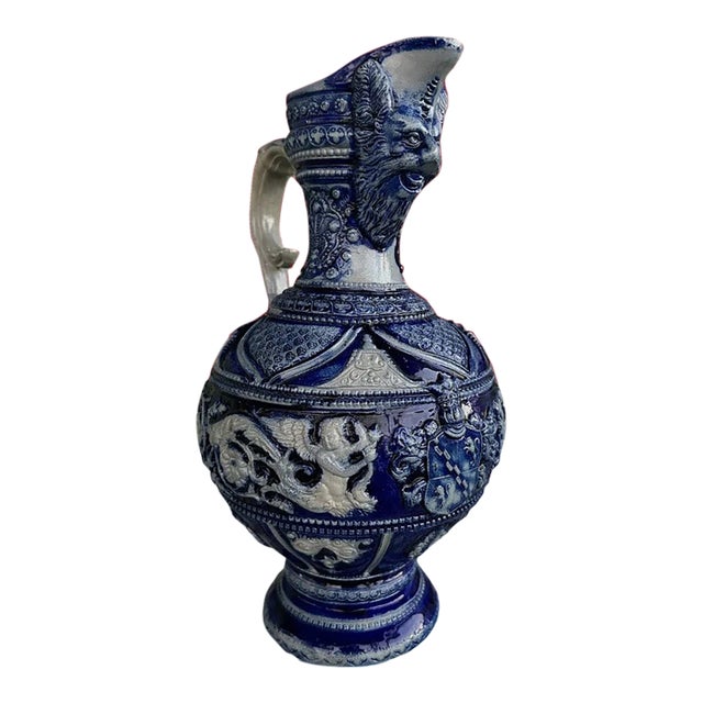 Mid 19th Century German Renaissance Revival Style Westerwald Salt Glazed Stoneware Coat of Arms Motif Satyr Spout Bulbous Footed Ewer For Sale