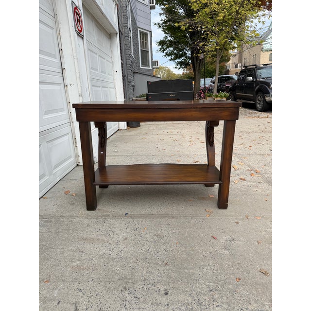 Vintage Neoclassical Revival Console Table With Ornately Carved Scroll Supports and Lower Shelf For Sale - Image 12 of 12