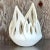 This late 20th-century vintage studio pottery cache pot boasts a dramatic flame-shaped design, making it a striking...