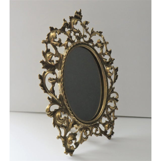 Brass Mirror Leaf Scrolled Art Nouveau Oval Vintage Hollywood Regency Excellent condition. Clean, no damage. Estate sale...