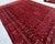 A commanding vintage Afghan Bashiri tribal rug from northern Afghanistan — hundreds of small rounded rosette guls in a...