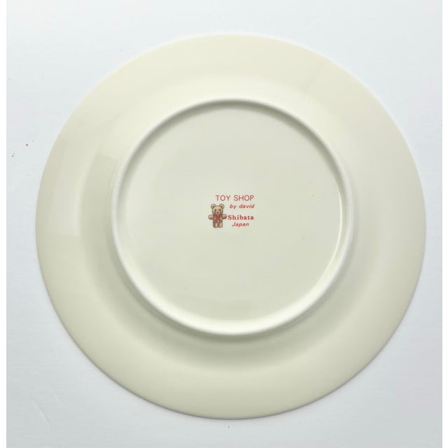 1980s (David) Shibata Toki “Toy Shop” Set of 8 Christmas Bone China Salad Plates For Sale - Image 4 of 4