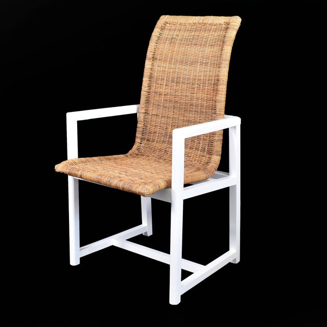 Pair of Danny Ho Fong Style Wood and Woven Rattan Arm Chairs in nice as found vintage condition. There are minor...