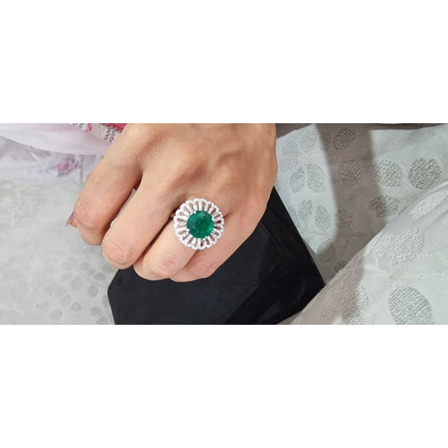 this is a beautiful natural Zambian Emerald ring for daily wear. the Emerald is of very high quality and diamonds are very...