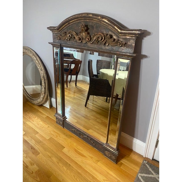 Reproduction Traditional large wall mirror with ornate carved wooden frame.