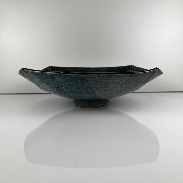 Dark blue/green glazed ceramic bowl by Pierre Baey, 1960 Dimensions: 33.5 x 29 cm Height: 10 cm Good overall condition,...